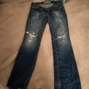 Women's Low Rise Distressed Blue Jeans